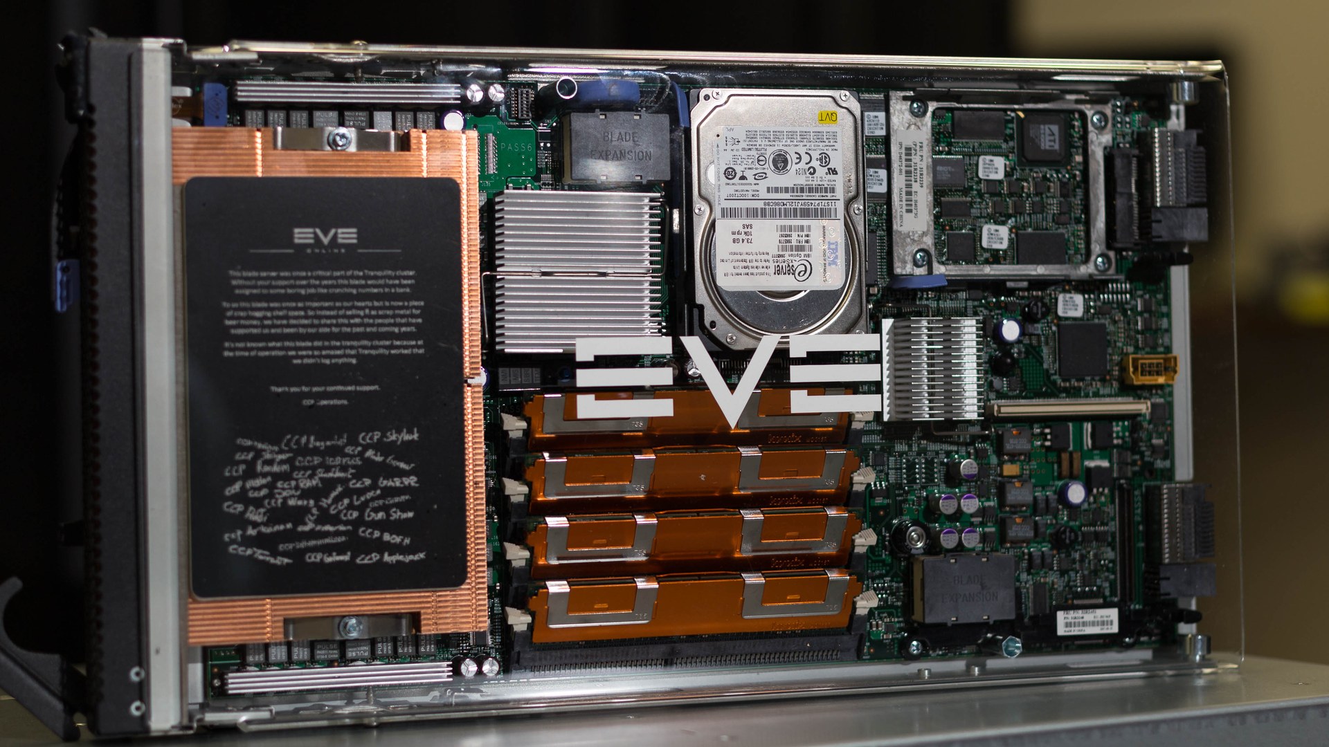 A refurbished retired Tranquility server blade with its commemorative plaque and EVE Online logo