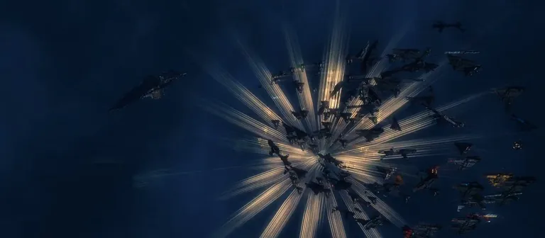 A cynosural field flares white as a fleet bridges into the grid, ships fanning out from the jump flare over Venal - attacker point of view, January 2022.